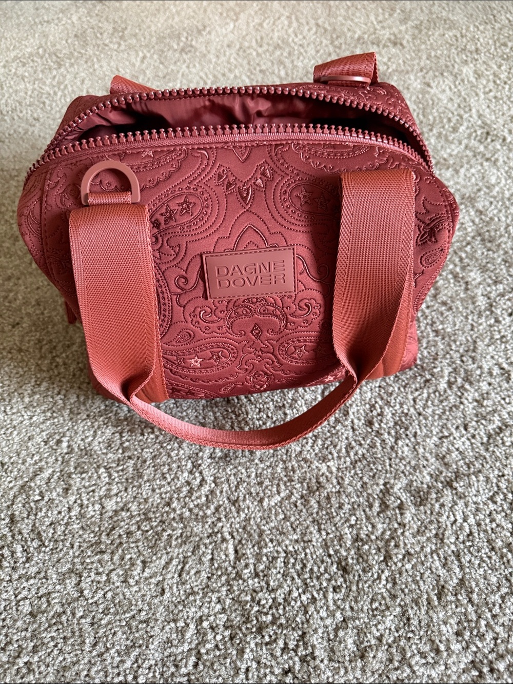Dagne Dover Paisley Embossed Cosmetic Bag in Rust
